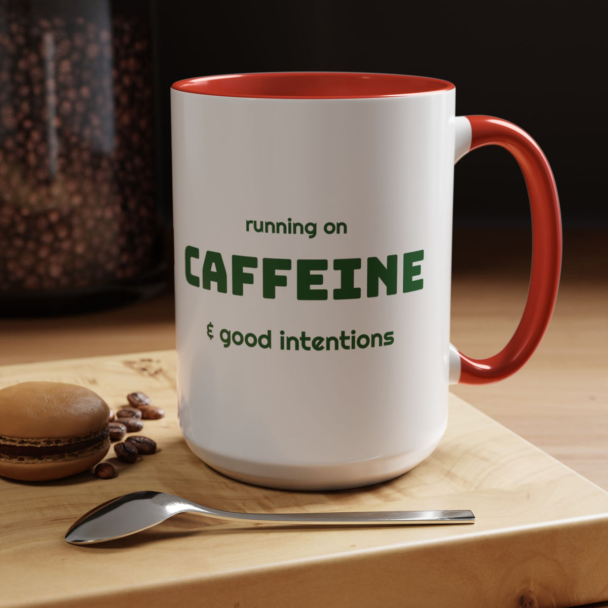 Caffeine and Good Intentions mug, green lettering, red handle