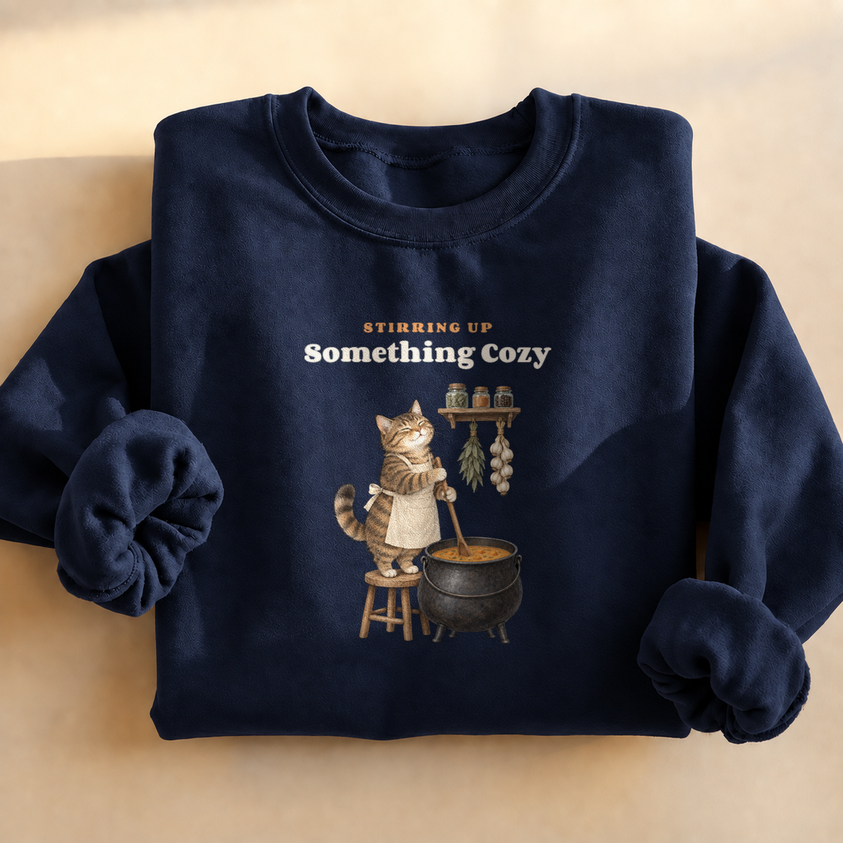 Cauldron Cat Cottagecore Sweatshirt, cat cooking herbs in a cauldron, for witchy cat lovers and cottagecore fans
