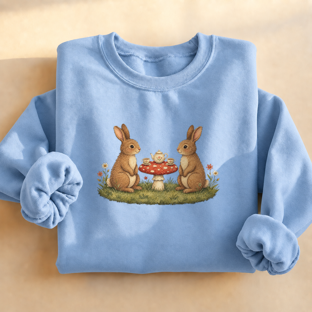 Bunny Teatime Cottagecore Sweatshirt, bunnies having tea on a toadstool, for bunny lovers and cottagecore fans