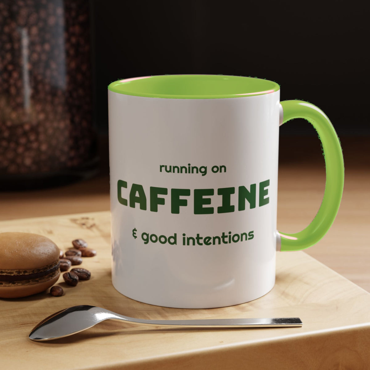 Caffeine and Good Intentions mug, green lettering, light green handle, 11oz