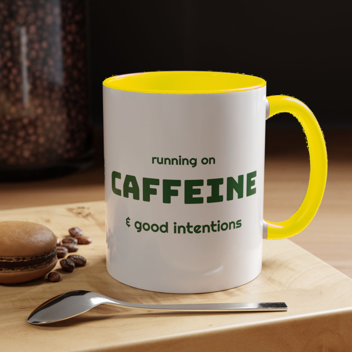 Caffeine and Good Intentions mug, green lettering, yellow handle, 11oz